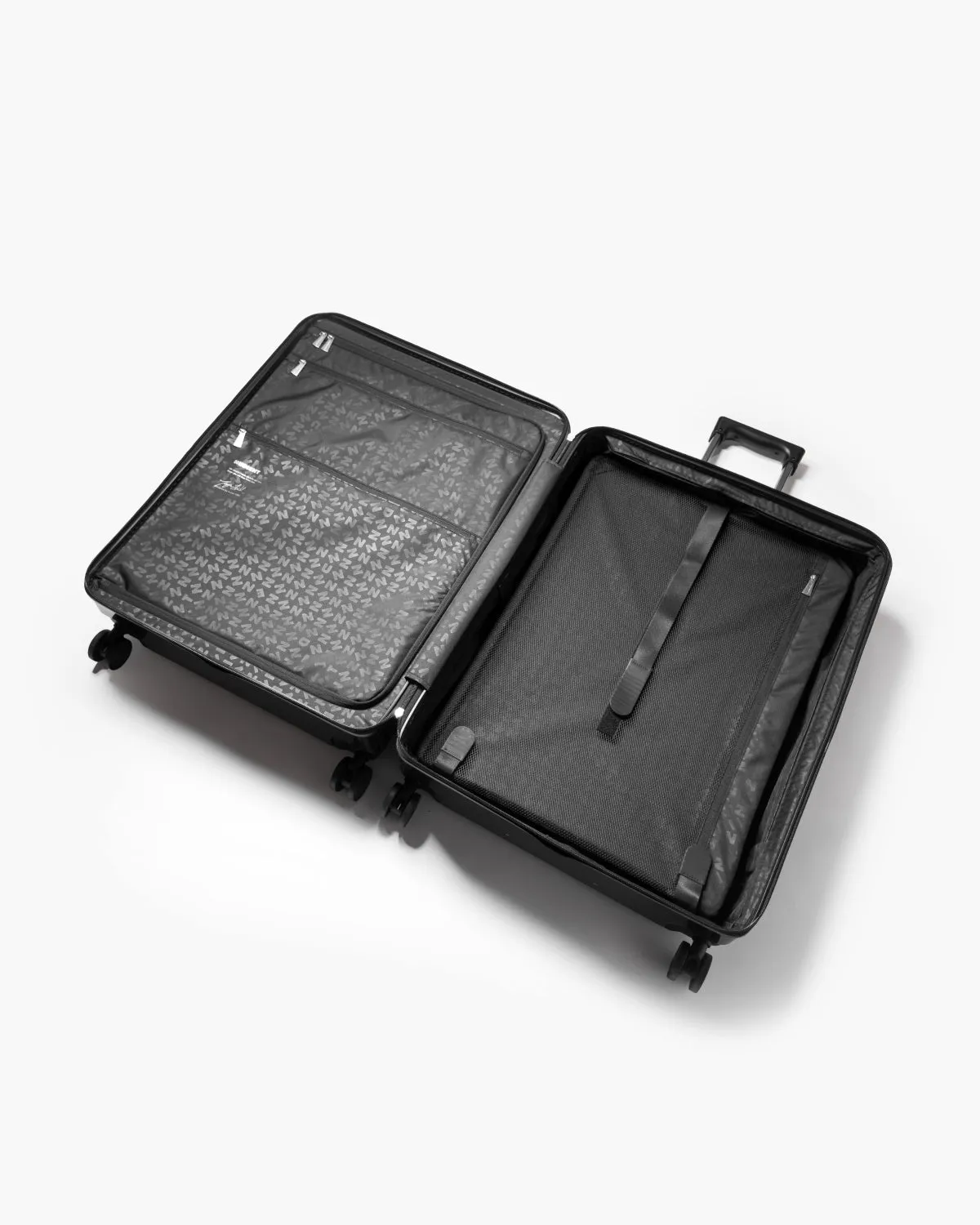 Nudient Bold Check-in L valigia Urban Grey rigida leggera